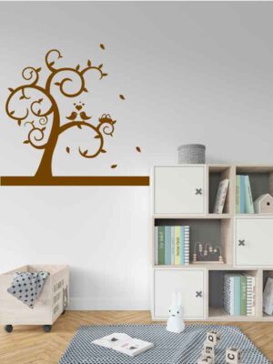Diseño vinilo con color marrón de árbol con pájaros decorando una pared