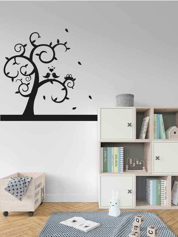 Diseño vinilo con color negro de árbol con pájaros decorando una pared